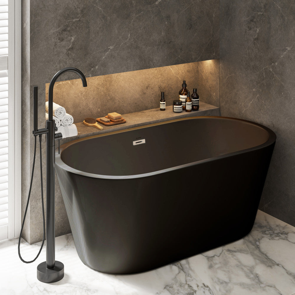 Freestanding soaking bathtub 60 inch in matte black with center drain and sleek modern design.