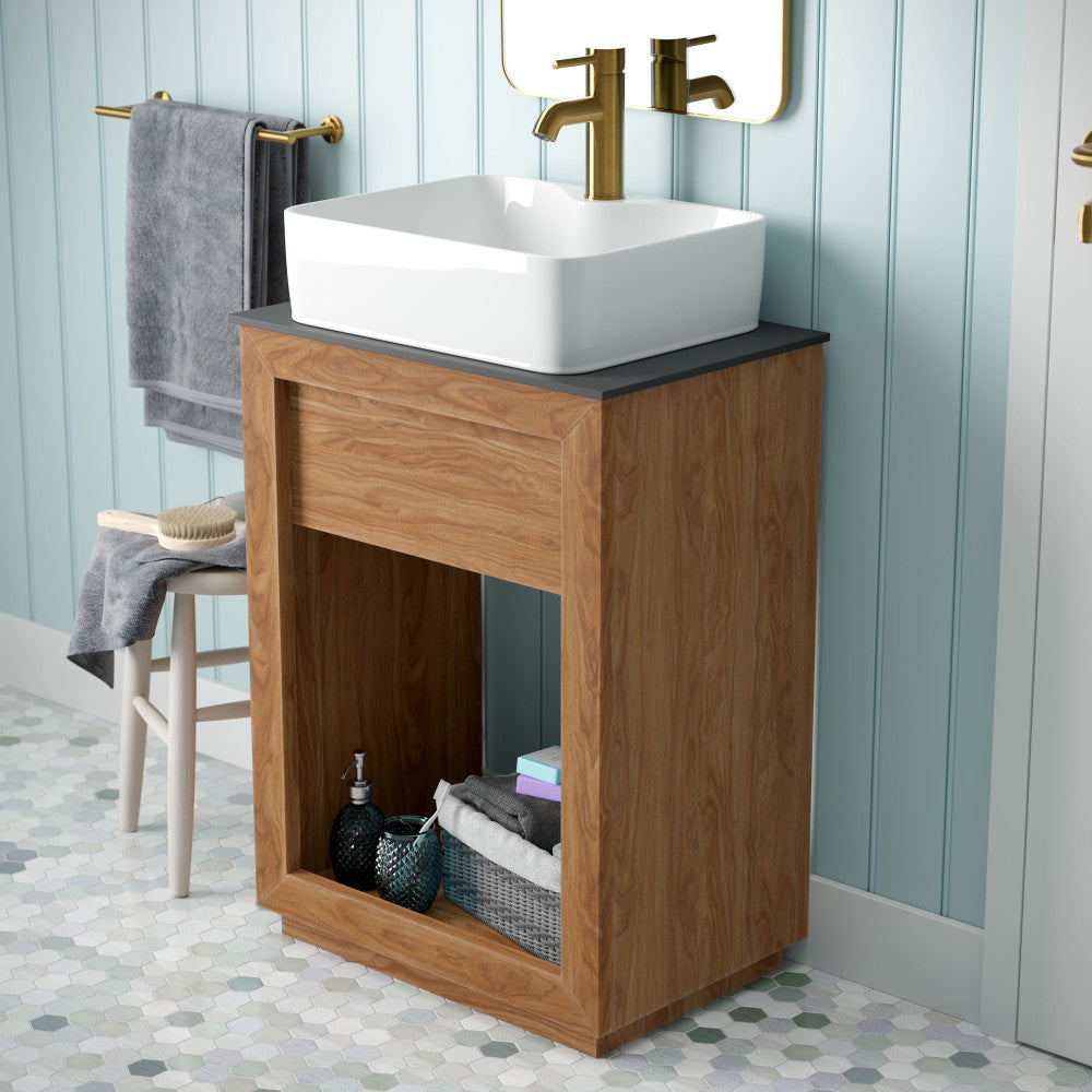 24-inch freestanding reclaimed wood vanity in natural teak with slate countertop and white vessel sink.