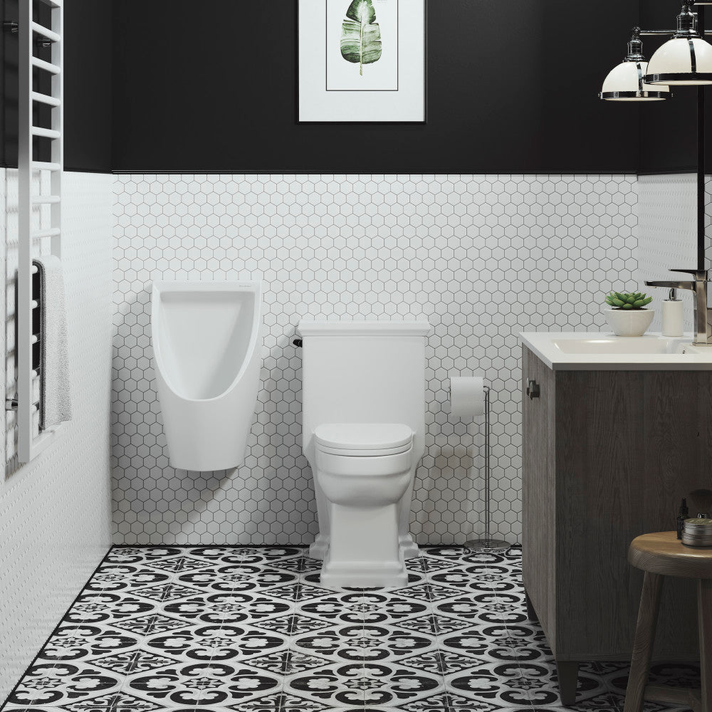 White wall-hung waterless urinal with smooth curved design mounted in modern bathroom.