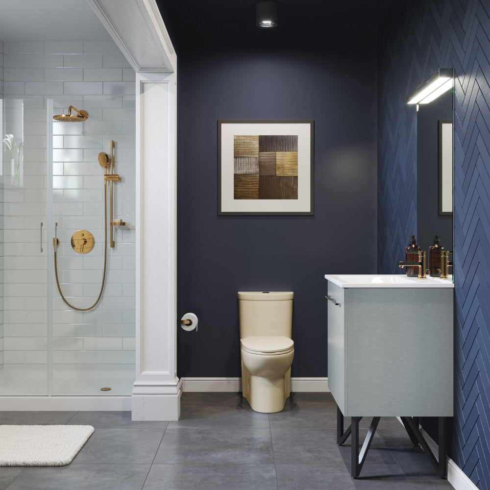 Elongated one-piece toilet in bisque with dual-flush, sleek skirted trapway design.