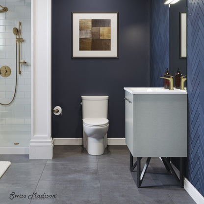 24-inch freestanding bathroom vanity in gray with single sink and black metal legs.