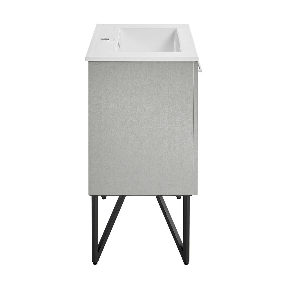 24-inch freestanding gray bathroom vanity with single sink and black metal legs.