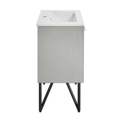 24-inch freestanding gray bathroom vanity with single sink and black metal legs.