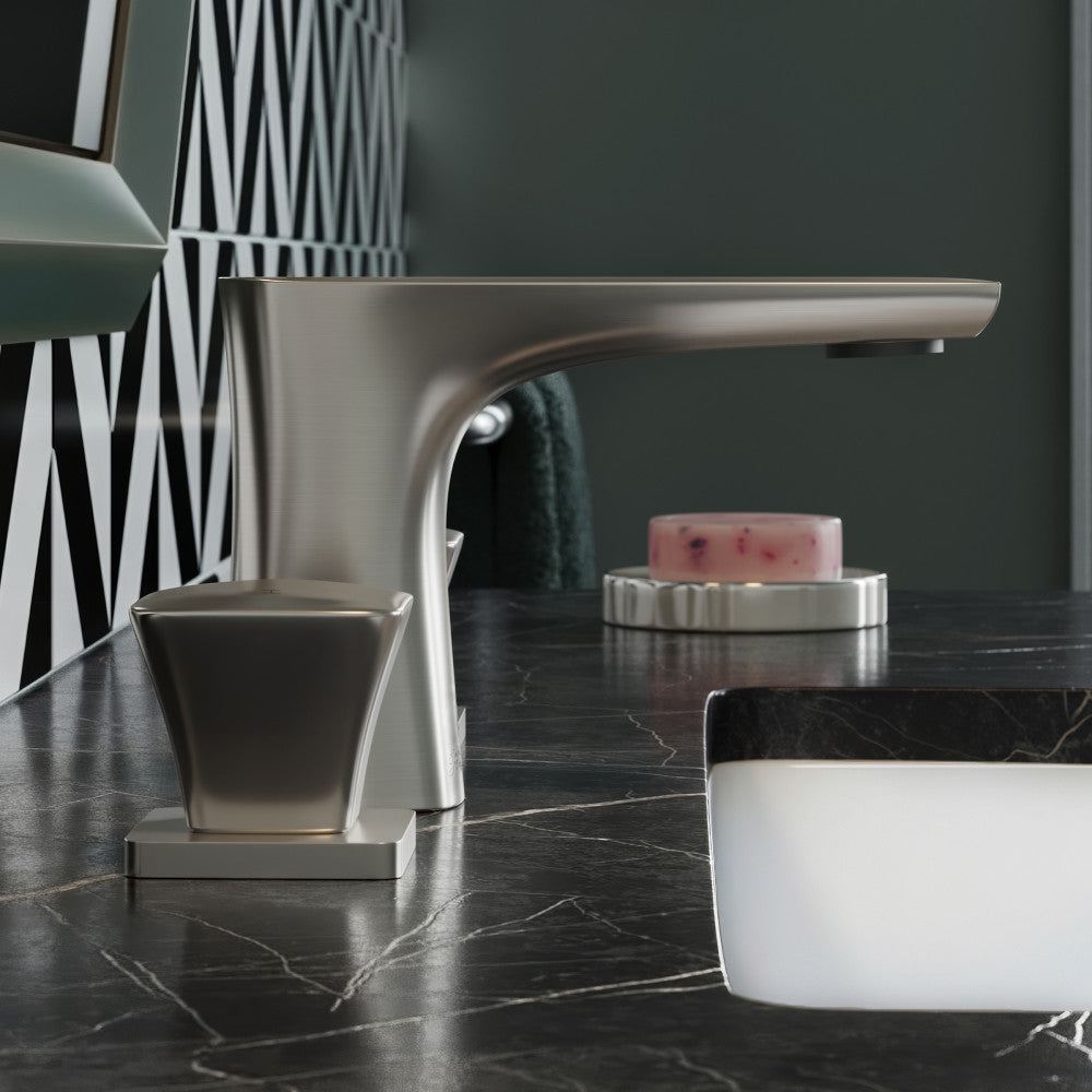 Widespread bathroom faucet in brushed nickel, two-handle design with square bases and curved spout.