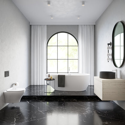Round vessel sink in matte black, 16.5 inches diameter, modern minimalist bathroom design.