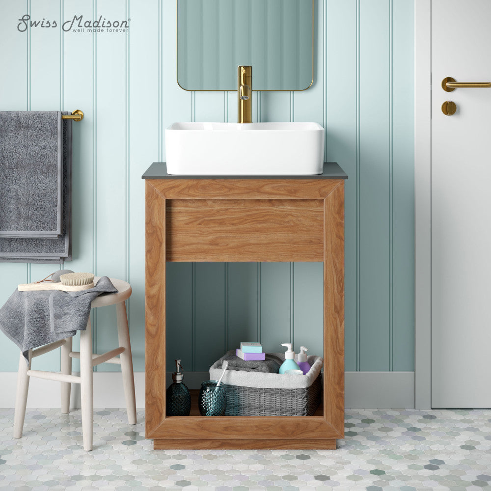 24-inch freestanding reclaimed wood vanity with slate countertop and single hole vessel sink.