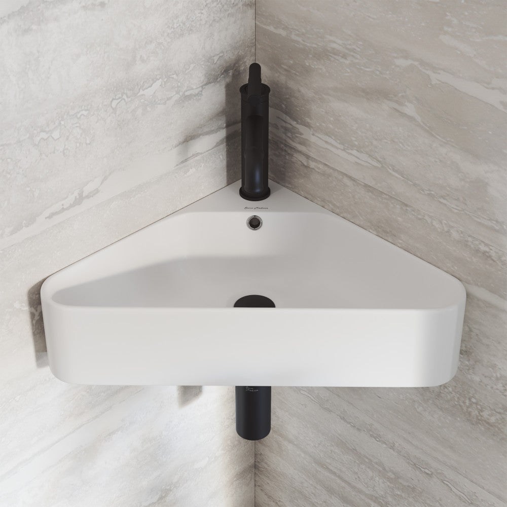 Corner wall-hung bathroom sink in white, compact design for space-saving installation.