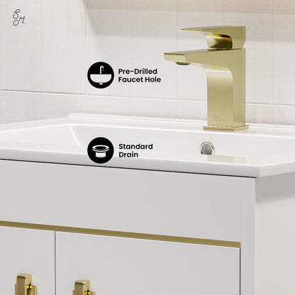 24-inch freestanding white bathroom vanity with sink top, gold faucet, and soft-close doors.