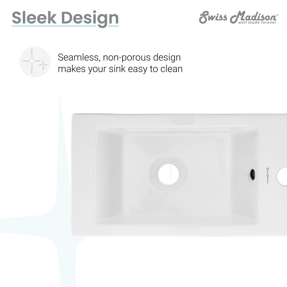 Rectangular white ceramic wall-hung sink with right side faucet mount and seamless design.