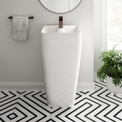 Tall white one-piece pedestal sink with square basin and single-hole faucet mount.