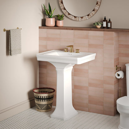 Two-piece pedestal sink in white with a rectangular basin and classic column base.