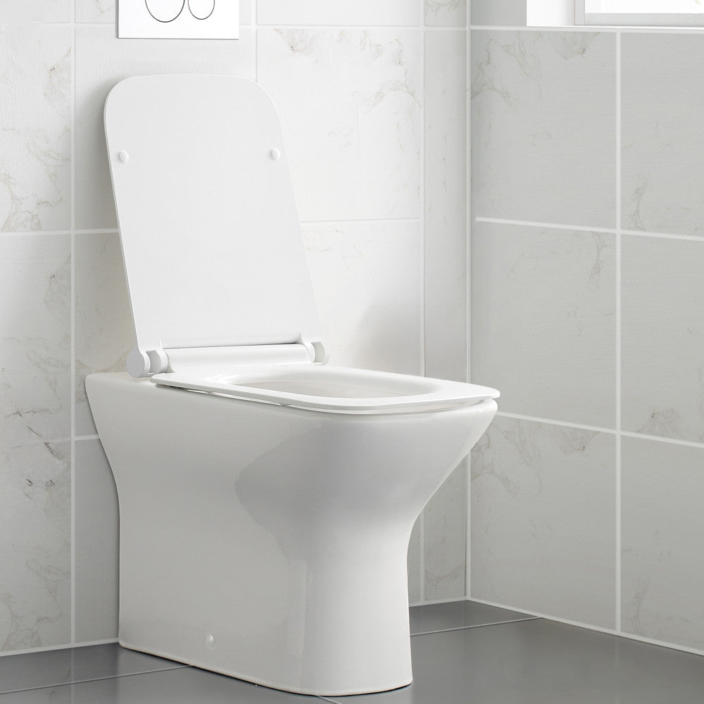Back-to-wall square toilet bowl, compact design, soft-close seat, white ceramic.