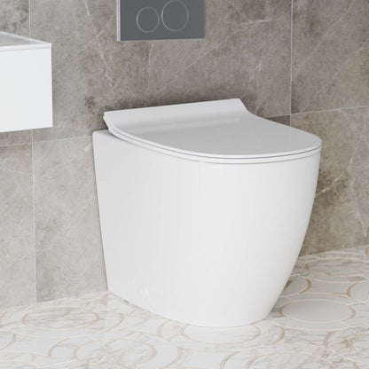 Back-to-wall toilet in glossy white with concealed tank and soft-close seat.
