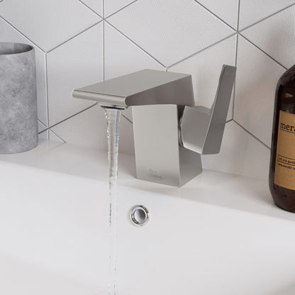 Single-handle bathroom faucet in brushed nickel, modern square design with flowing water.