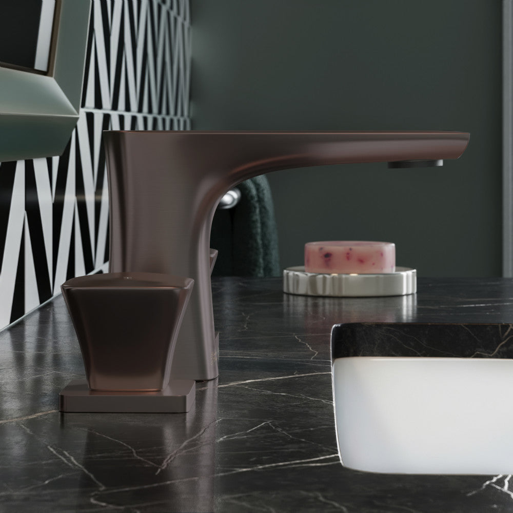 Widespread bathroom faucet in oil rubbed bronze, two-handle design with angular base and spout.