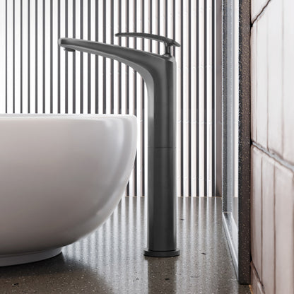 Single-handle high arc bathroom faucet in gunmetal gray, sleek modern design.