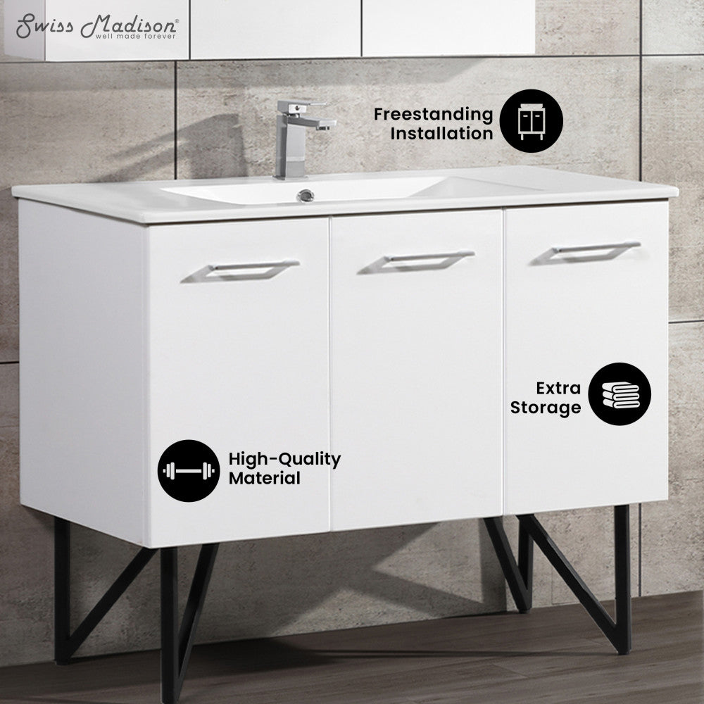 48-inch freestanding white bathroom vanity with sink top and three-door storage, modern handles.
