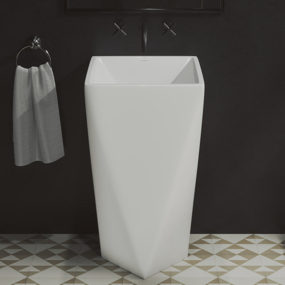 White one-piece pedestal sink with rectangular basin and tapered square base.