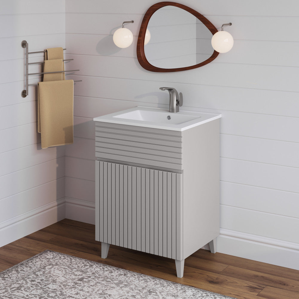 24-inch freestanding bathroom vanity in shell color, single sink, ribbed door design, angled legs.
