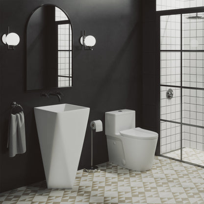 Brusque one-piece pedestal sink in white, tapered rectangular basin with smooth edges.
