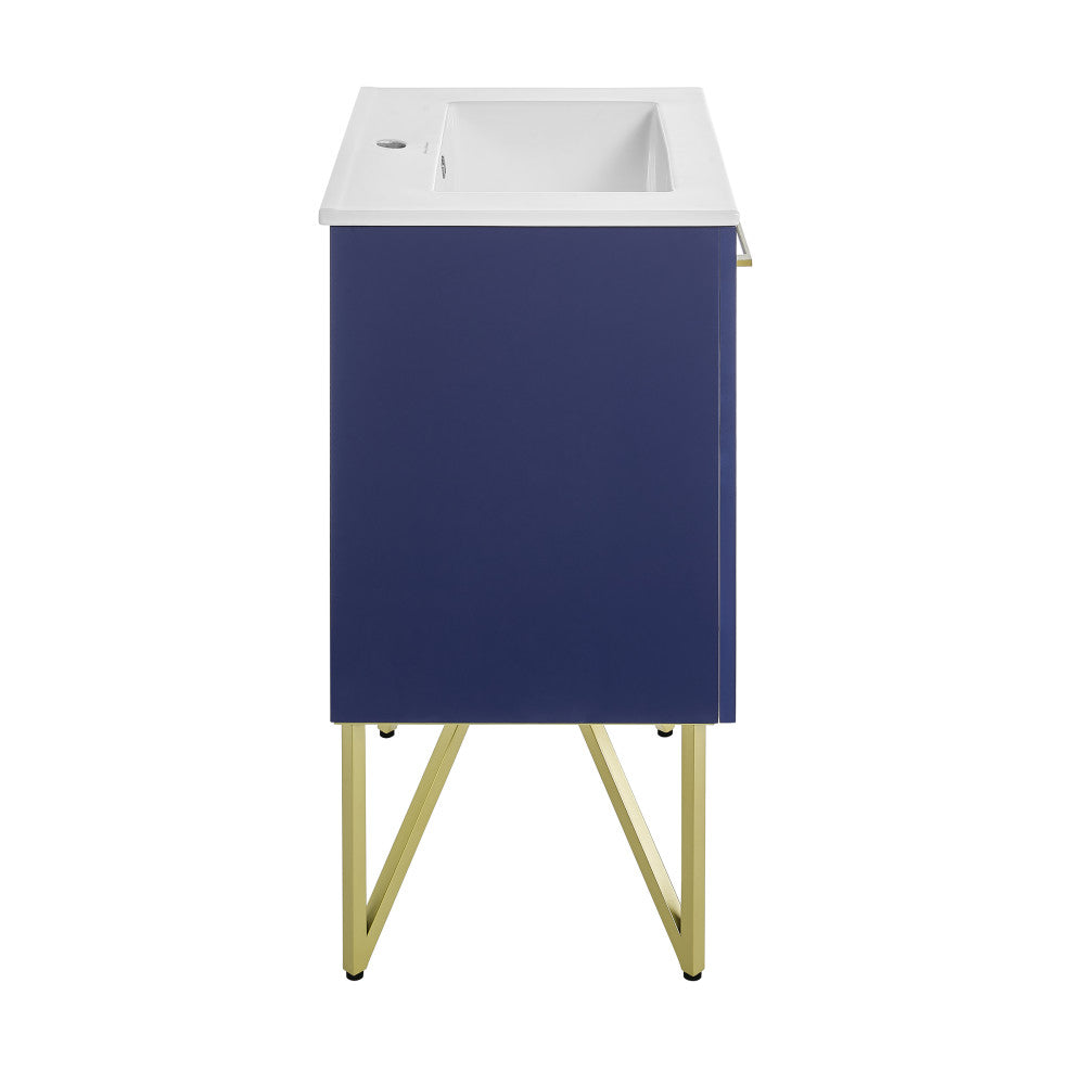 24-inch freestanding navy blue bathroom vanity with white single sink and gold legs, soft-close doors.