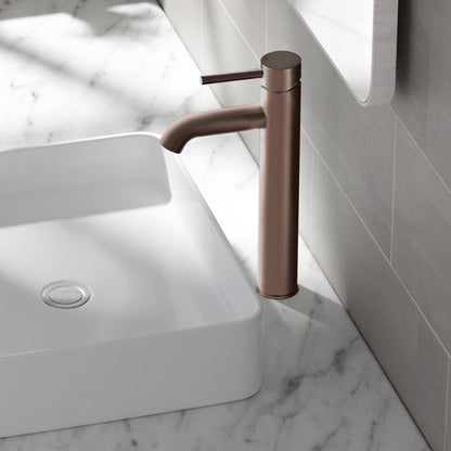 High arc single-handle bathroom faucet in oil rubbed bronze with cylindrical design.