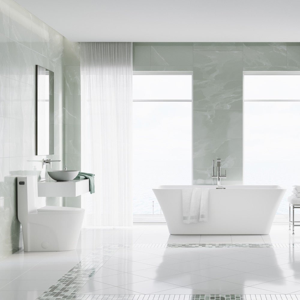 Elongated one-piece toilet with side flush and black hardware in bright modern bathroom setting.