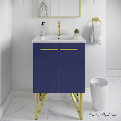 24-inch freestanding navy blue bathroom vanity with single sink and gold metal legs.