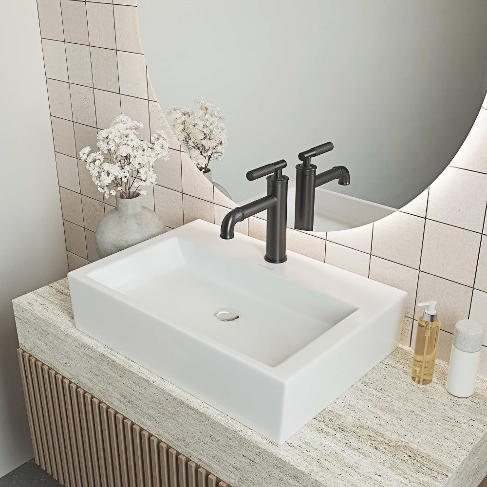 Matte white rectangular ceramic vessel sink with clean lines, integrated drain hole, and smooth finish.