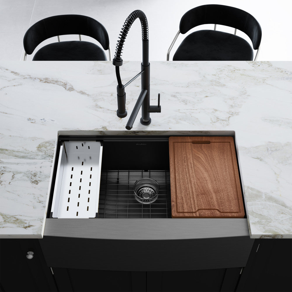 33 x 22-inch black stainless steel farmhouse sink with single basin, apron front, drain rack, and wooden cutting board.