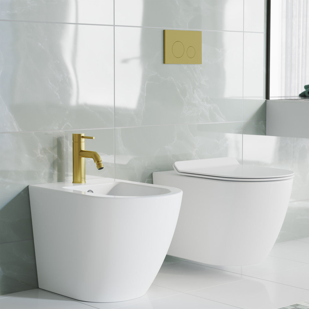 Single-handle bidet faucet in brushed gold with minimalist cylindrical design.