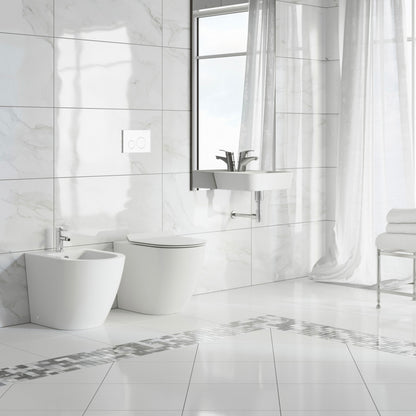 Floor-mount classic bidet in glossy white, modern design with chrome faucet.