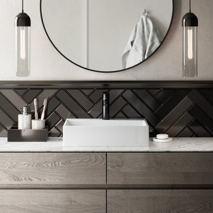 Rectangular white ceramic vessel sink with clean modern lines on wooden vanity with black faucet.