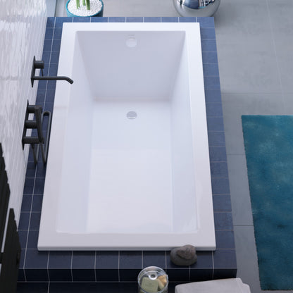 Drop-in rectangular bathtub 60x36 inch, reversible drain, white acrylic finish.