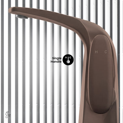 Single-handle high arc bathroom faucet in oil rubbed bronze with temperature markings.