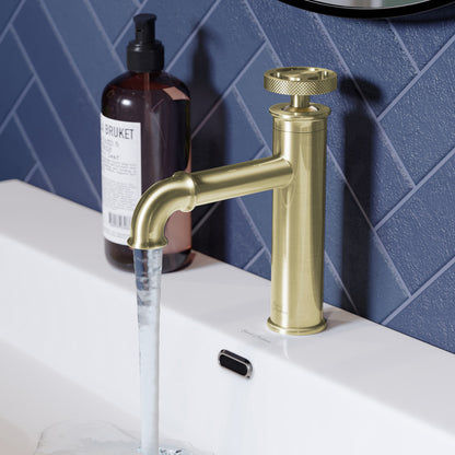 Single-handle bathroom faucet in brushed gold, Avallon collection, single-hole mount.