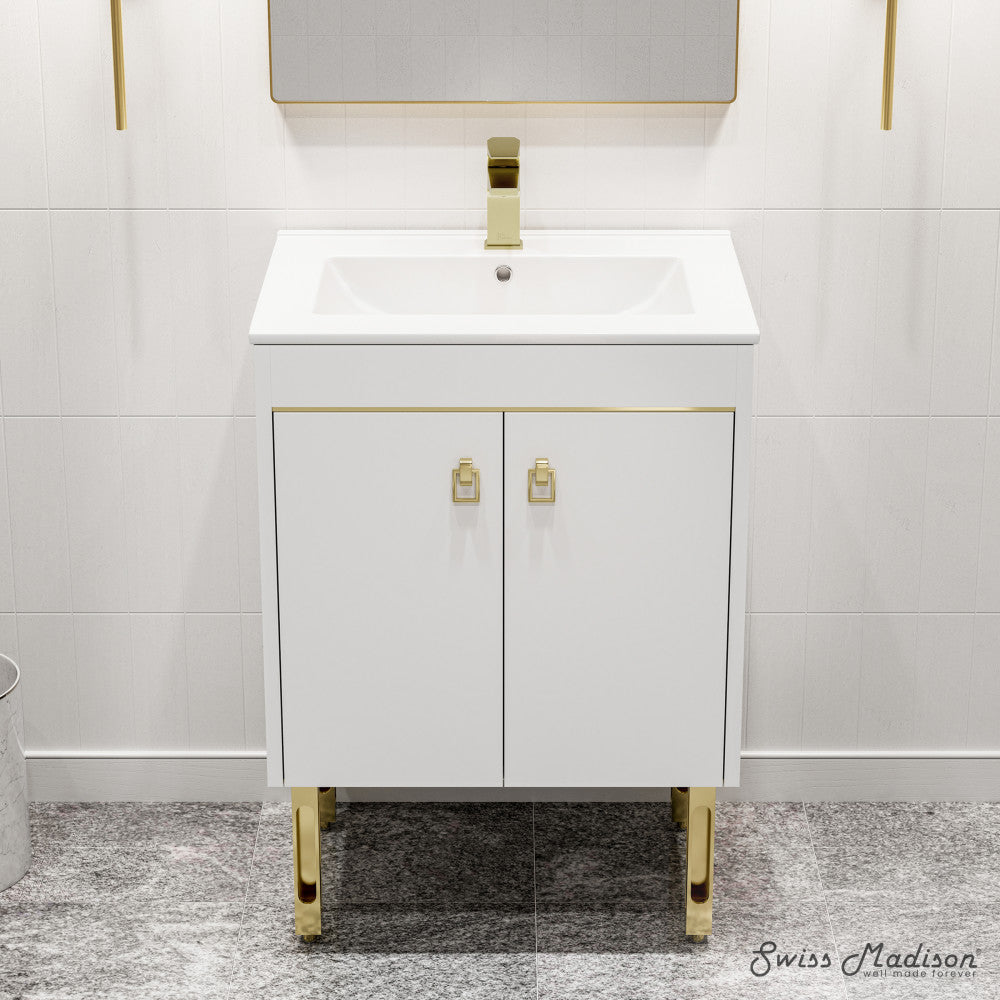 24-inch freestanding white bathroom vanity with sink top, gold handles, and legs.