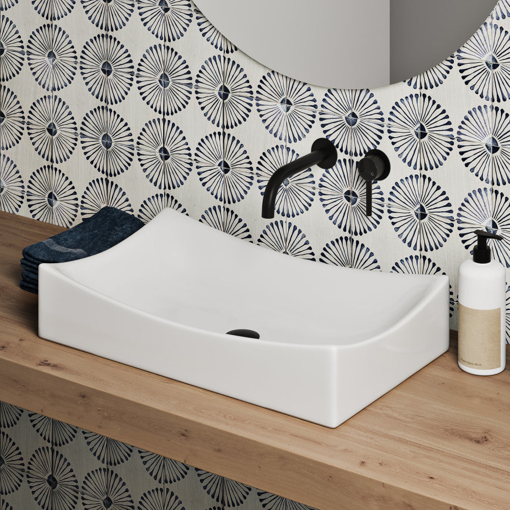 25.5-inch rectangular white vessel sink with smooth curved edges on wooden countertop.