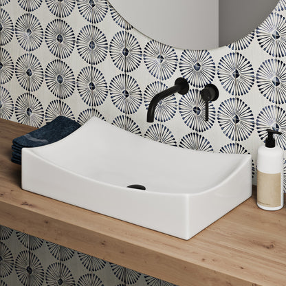25.5-inch rectangular white vessel sink with smooth curved edges on wooden countertop.