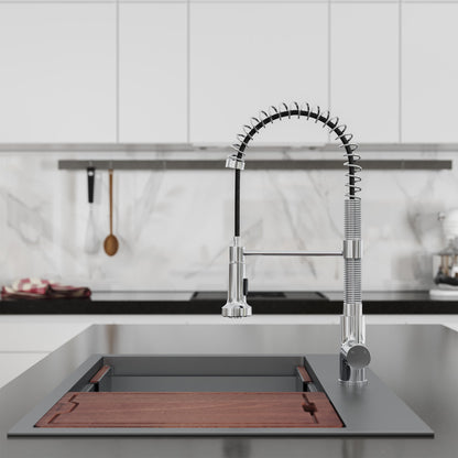 Single handle pull-down kitchen faucet in chrome, flexible coil spring spout design.