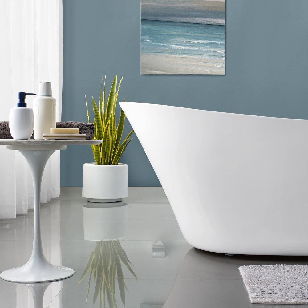 Freestanding white slipper bathtub 67 inch with center drain, sleek modern design.
