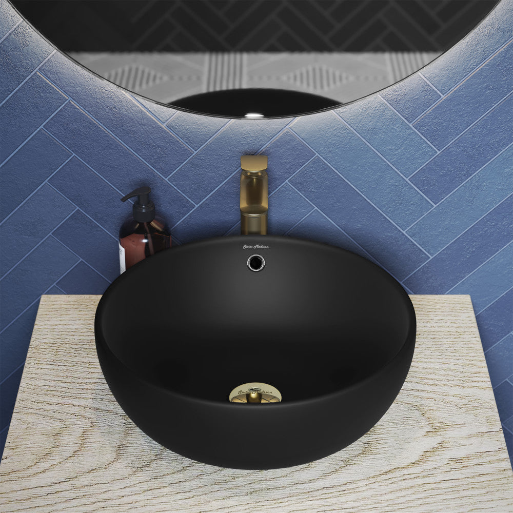 17-inch round matte black vessel sink with smooth finish and centered drain hole.