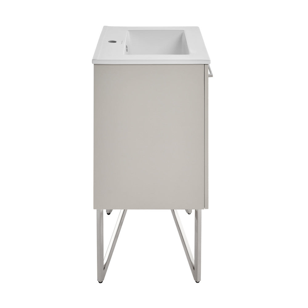 24-inch freestanding bathroom vanity in greige with single sink and chrome legs.