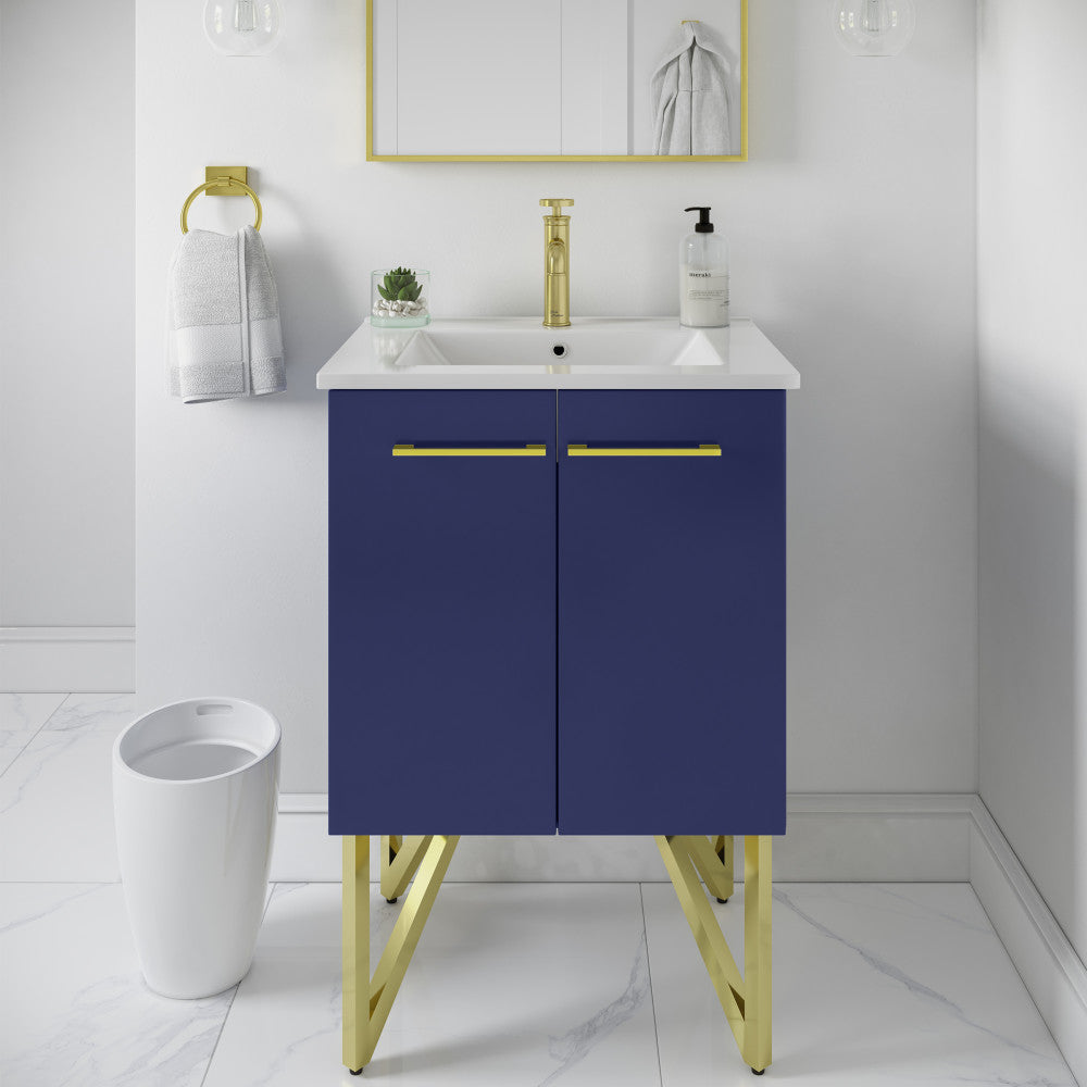 24-inch freestanding navy blue bathroom vanity with gold legs and handles, white sink top, and single faucet hole.