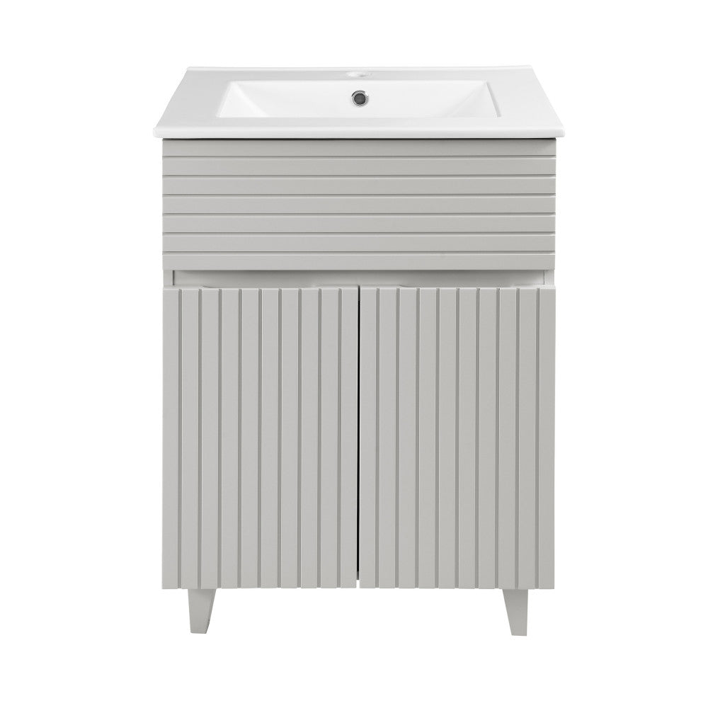 24-inch freestanding bathroom vanity in shell color, single sink, soft-close doors.