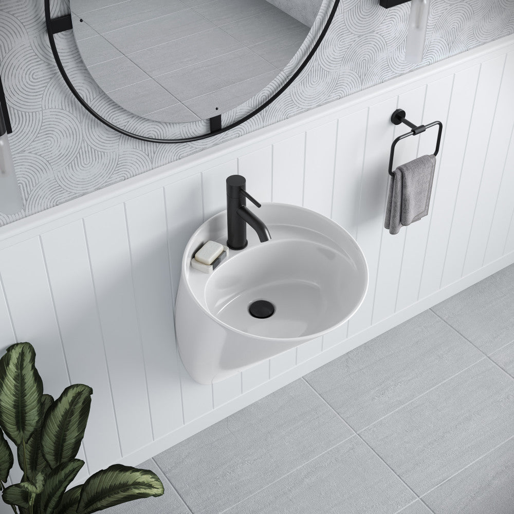 18" wall-mount bathroom sink in white with round basin and black single-handle faucet.