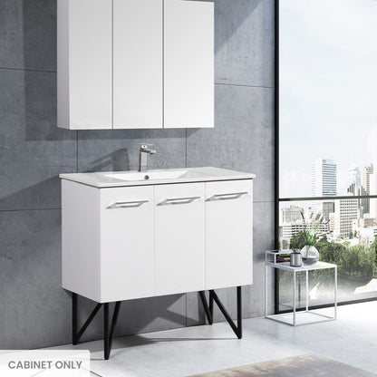 36-inch freestanding white bathroom vanity cabinet with three doors and modern angled legs.