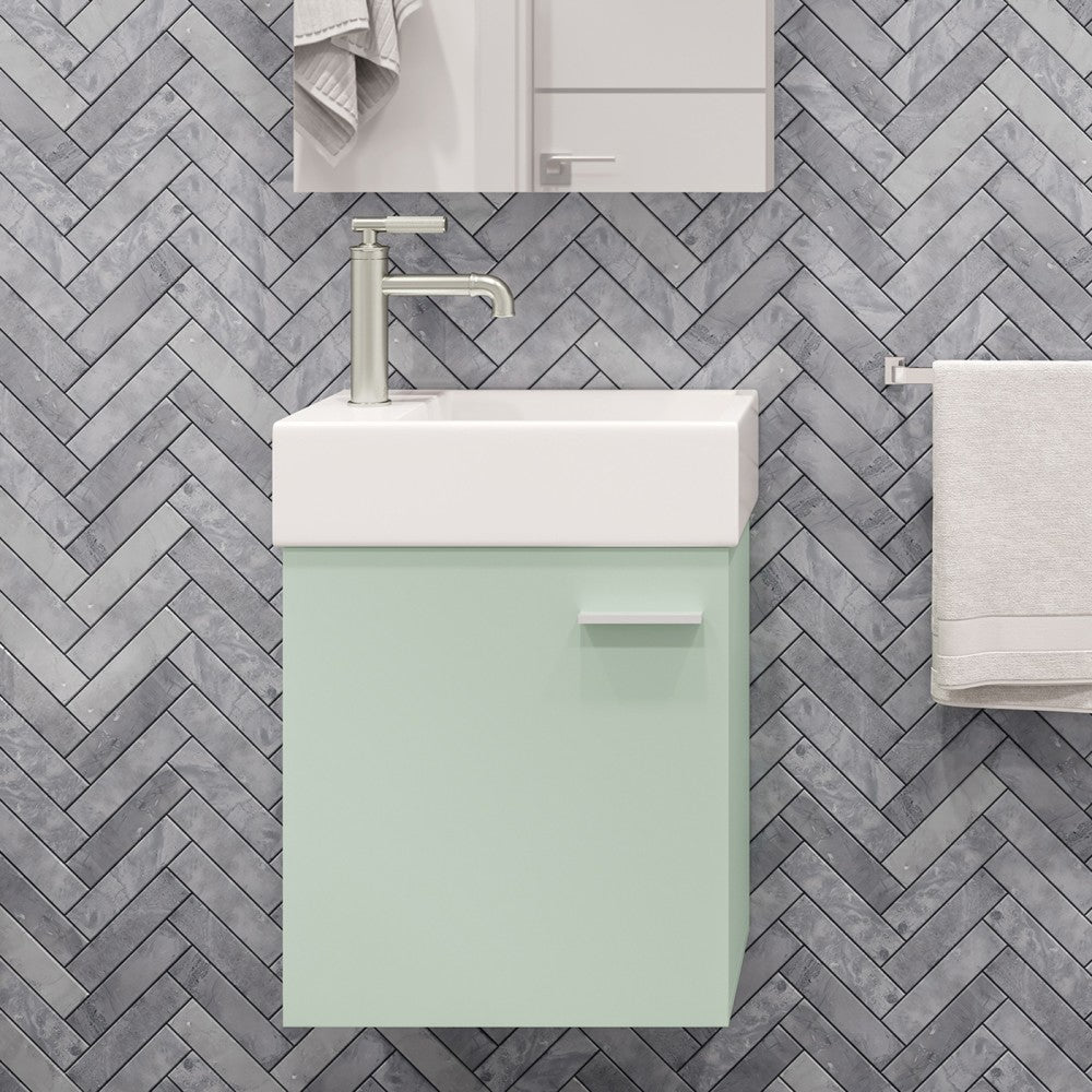 18-inch wall-mounted bathroom vanity in mint with soft-close door and integrated white sink.