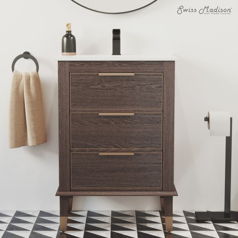 24-inch freestanding bathroom vanity in brown oak with single sink and three drawers.