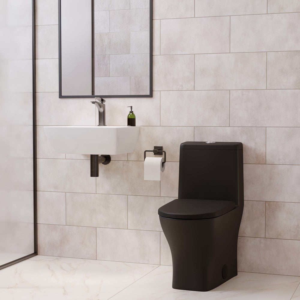 Round one-piece compact toilet in matte black with dual top flush and smooth skirted trapway.